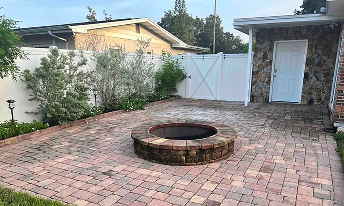 Before: faded, dirty fire-pit patio