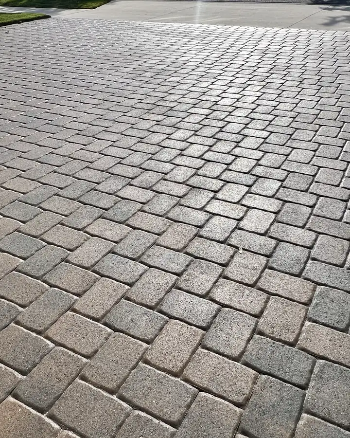 Close-up of cleaned pavers with fresh sand in every joint