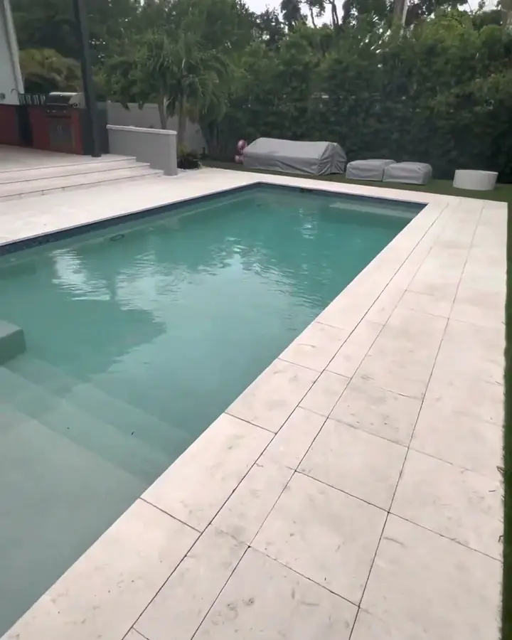 Travertine pool deck at a modern South Tampa home
